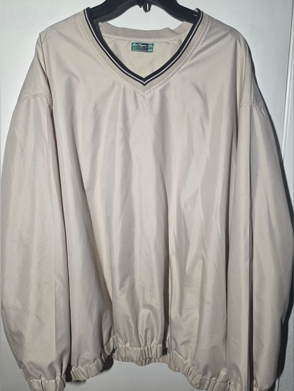 Ben Hogan Cream Golf Pullover with Black Striped V-Neck Trim